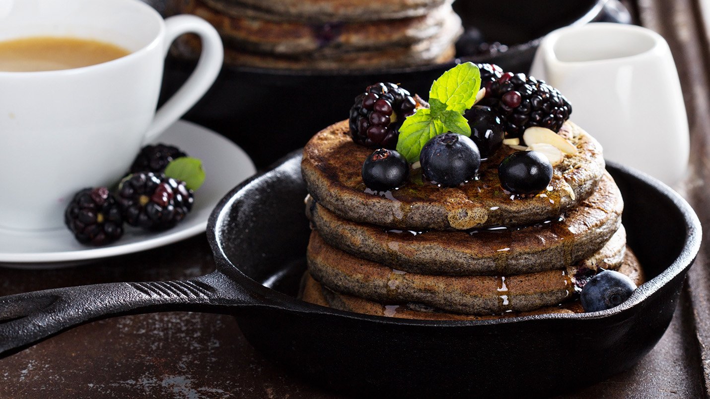 Blueberry-buckwheat pancakes with syrup and tea