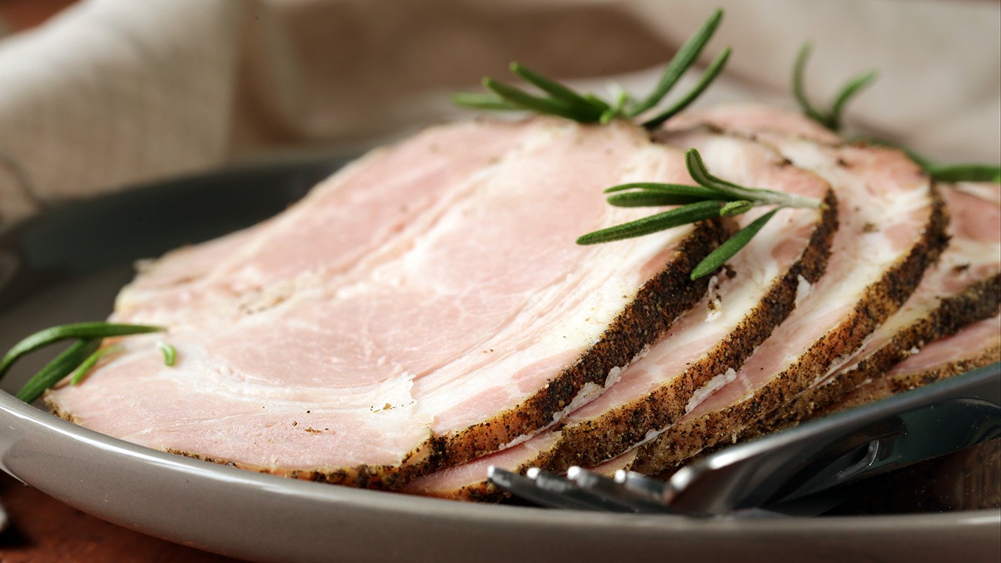 Poached pork roast with rosemary