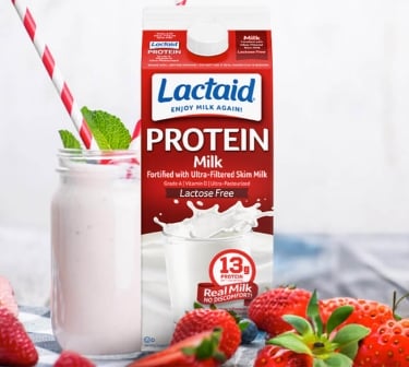 Strawberry milkshake with free weight and carton of Lactaid Protein Milk