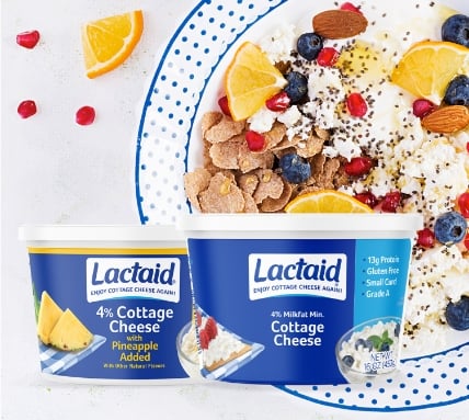 Lactaid Cottage Cheese shown with a bowl of cottage cheese, fruit, nuts, and corn flakes